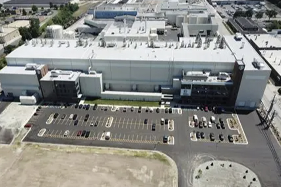 Exterior arial photo of a building and its parking lot.