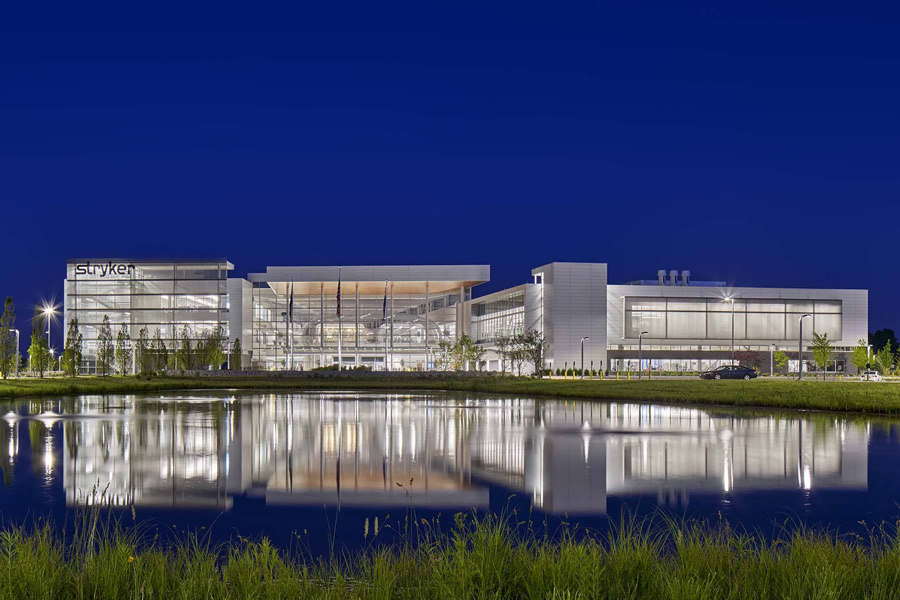 Exterior of the Stryker Instruments Division Facility and the water feature in front of it.